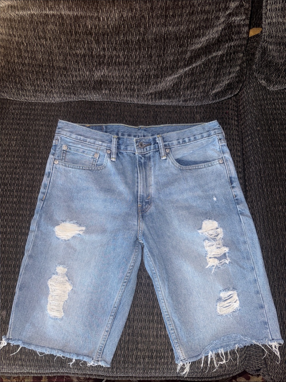 Men’s or women’s Levi's Distressed Denim Shorts. Sold this way, in stores now!